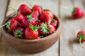 Fresh Strawberry in a wooden bowl