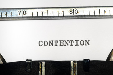 word contention typed on  typewriter