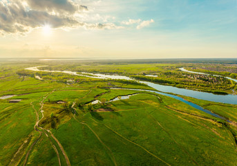 Beautiful sunset on the field. Aerial view.