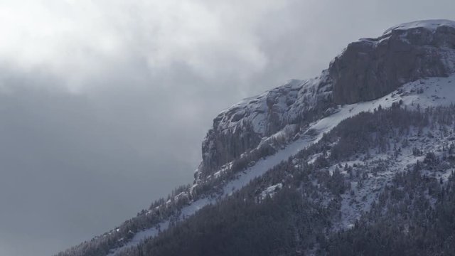 Clearing snow storm on the cliffs Ceuze mountain in the Southern French Alps (Hautes Alpes), France