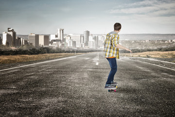 Boy ride skateboard