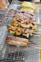 Grilled squid is delicious in the market.