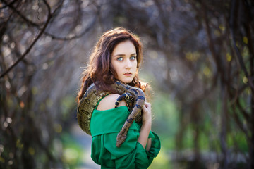 Attracrive girl with snake