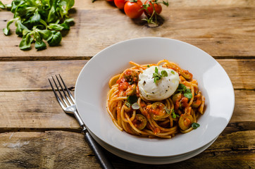 Italian pasta with poached egg
