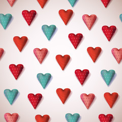 Seamless texture with textile hearts. Valentine card design.
