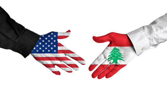 United States and Lebanon leaders shaking hands on a deal agreement