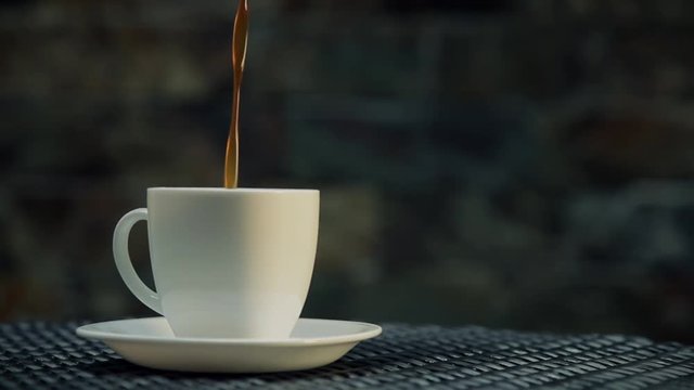 Serving coffe on white cup