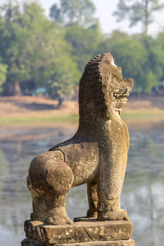 Sculpture of statue of lion with the pond in the archaeological site of Sras Srang at Angkor Wat, Siem Reap. UNESCO site in Cambodia.