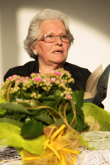 elegant elderly woman with glasses