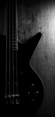 Body of a classic black bass guitar