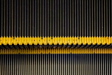 Abstract background texture of striped pattern of metal escalator foot step