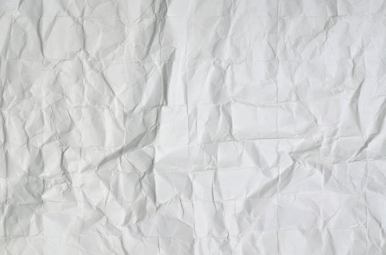 Hintergrund, wei&szlig;, zerkittertes Papier / Papier, wei&szlig;, zerknittert, Nahaufnahme, Detail, Format f&uuml;llend, horizontal 
