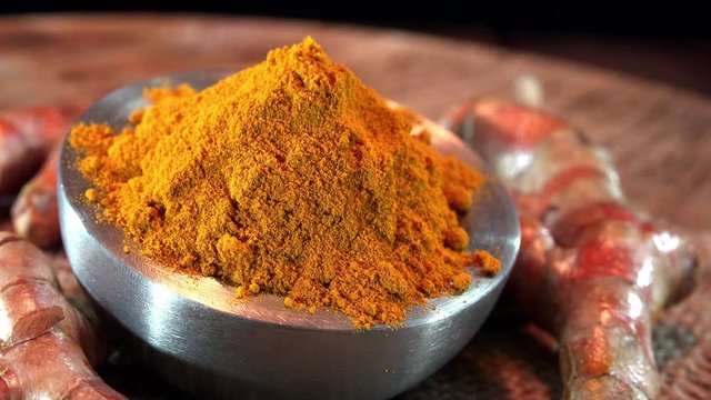 Portion of Curcuma as not seamless loopable rotating 4K UHD footage