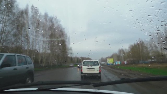 Raindrops on car windshield