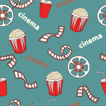 Cinema seamless pattern. Bright cinema symbols - popcorn, film reel and strip - isolated on blue. Vector background. 