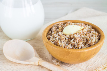 Buckwheat porridge in a wooden bowl
