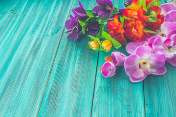 Flowers on wooden background