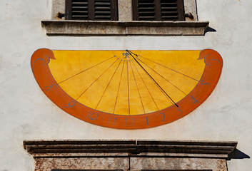 ancient Sundial with numerals marking the hours  during sunny da