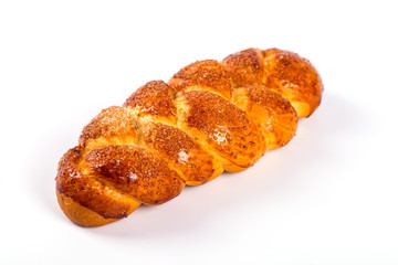 pile of fresh and delicious kroissants and rolls on a white back