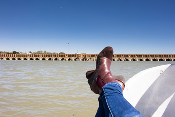 Relaxing on the boat next to Si-O-Se Pol, Isfahan, Iran