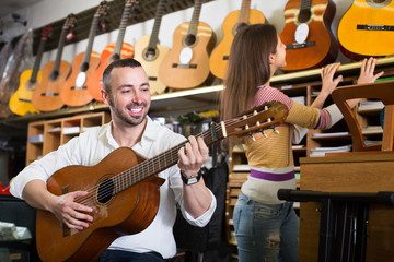 customers in music instruments shop