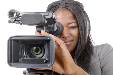 young African American women with professional video camera - Powered by Adobe