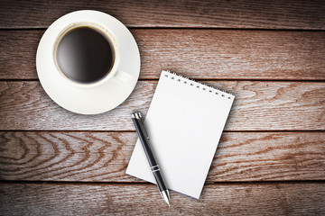 Obraz na płótnie Canvas coffee,notebook and pen