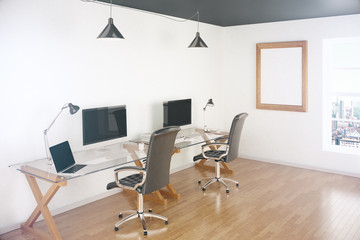 Office with blank screens