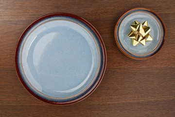 plate with a golden bow.