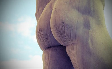 ass of the statue of marble with white buttocks