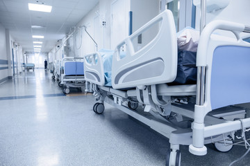 Long corridor in hospital with surgical transport. - 109404385