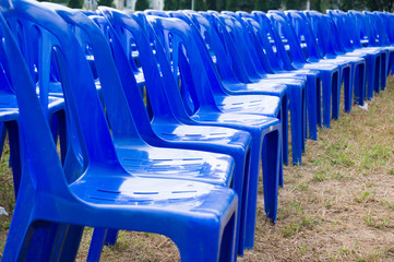 blue plastic chairs in celebration and outdoor event