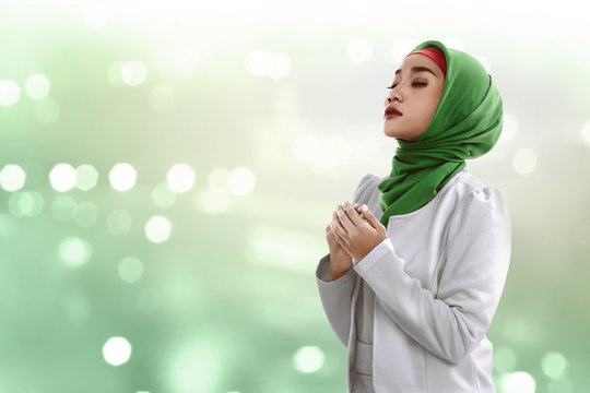 Asian muslim woman praying
