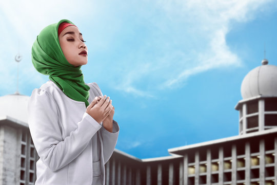 Asian muslim woman praying