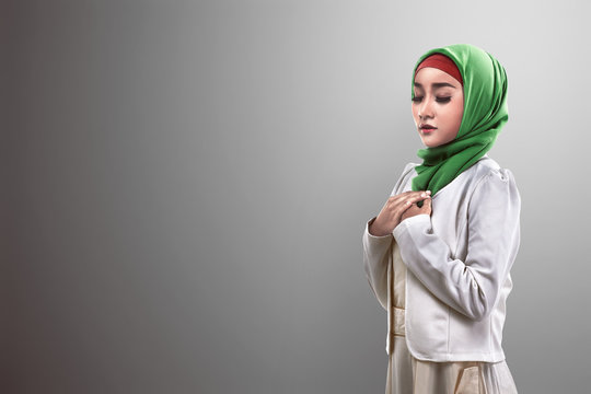 Asian muslim woman praying