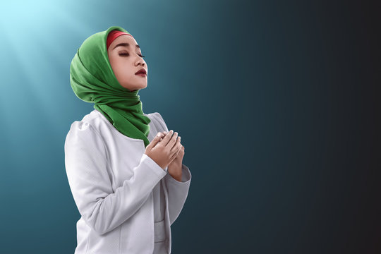 Asian muslim woman praying