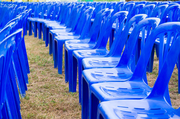 blue plastic chairs in celebration and outdoor event