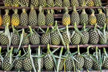 Fresh pineapple on shelf