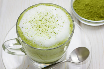Matcha gren tea latte in glass cup