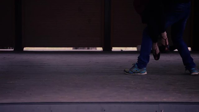 Dancers legs while dancing tango