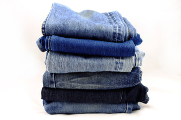 Jeans pile isolated on white background