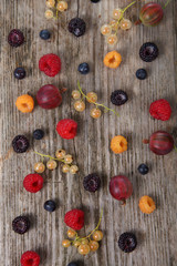 Naklejka na ściany i meble Various ripe berries on a table