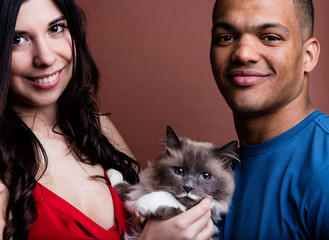 woman man and cat and here is the family