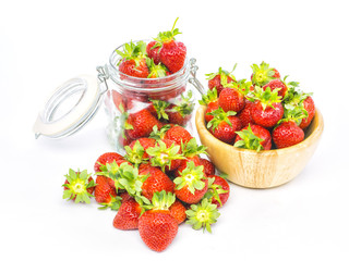 fresh whole strawberries in wooden bowl