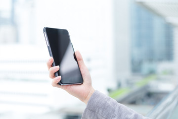 Businesswoman hold with phone