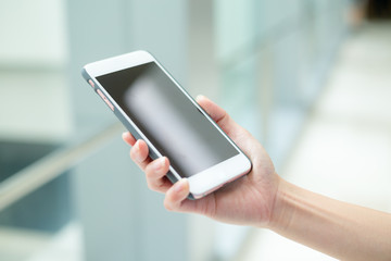 Woman hold with cellphone