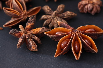 Star Anise on a black wood background