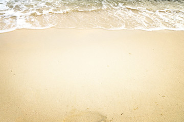 Sea summer abstract background. Golden sand beach with ocean waves. free space