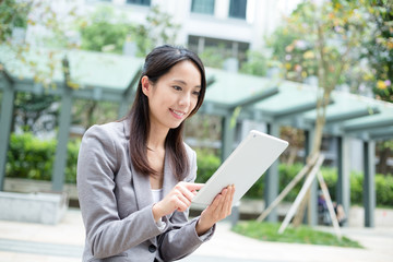 Fototapeta premium Businesswoman using a digital tablet