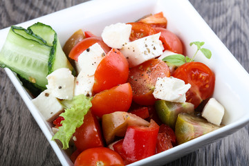 Salad with mozzarella, tomato and cucumber